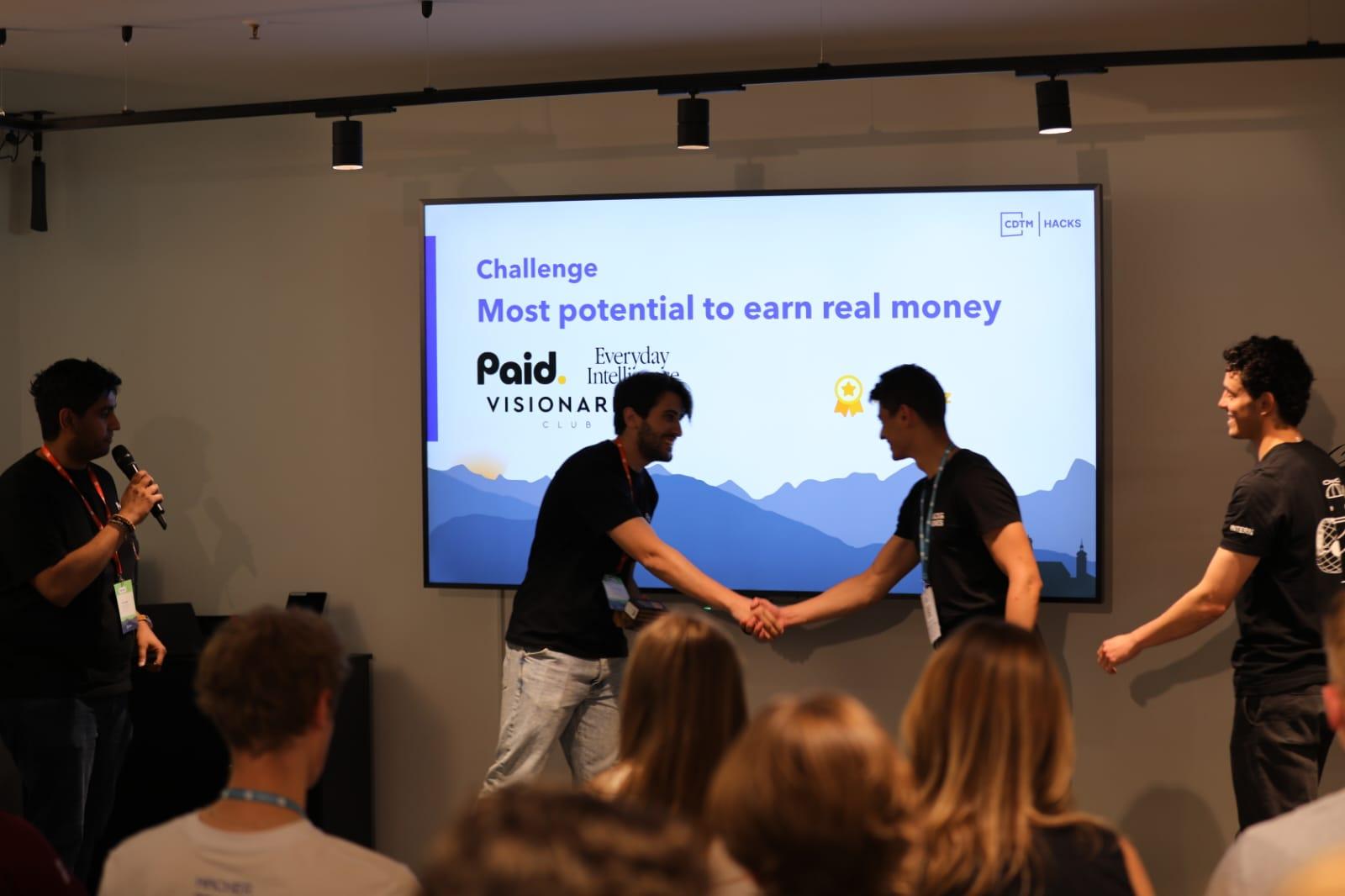 handshake with representative from 'Paid.'